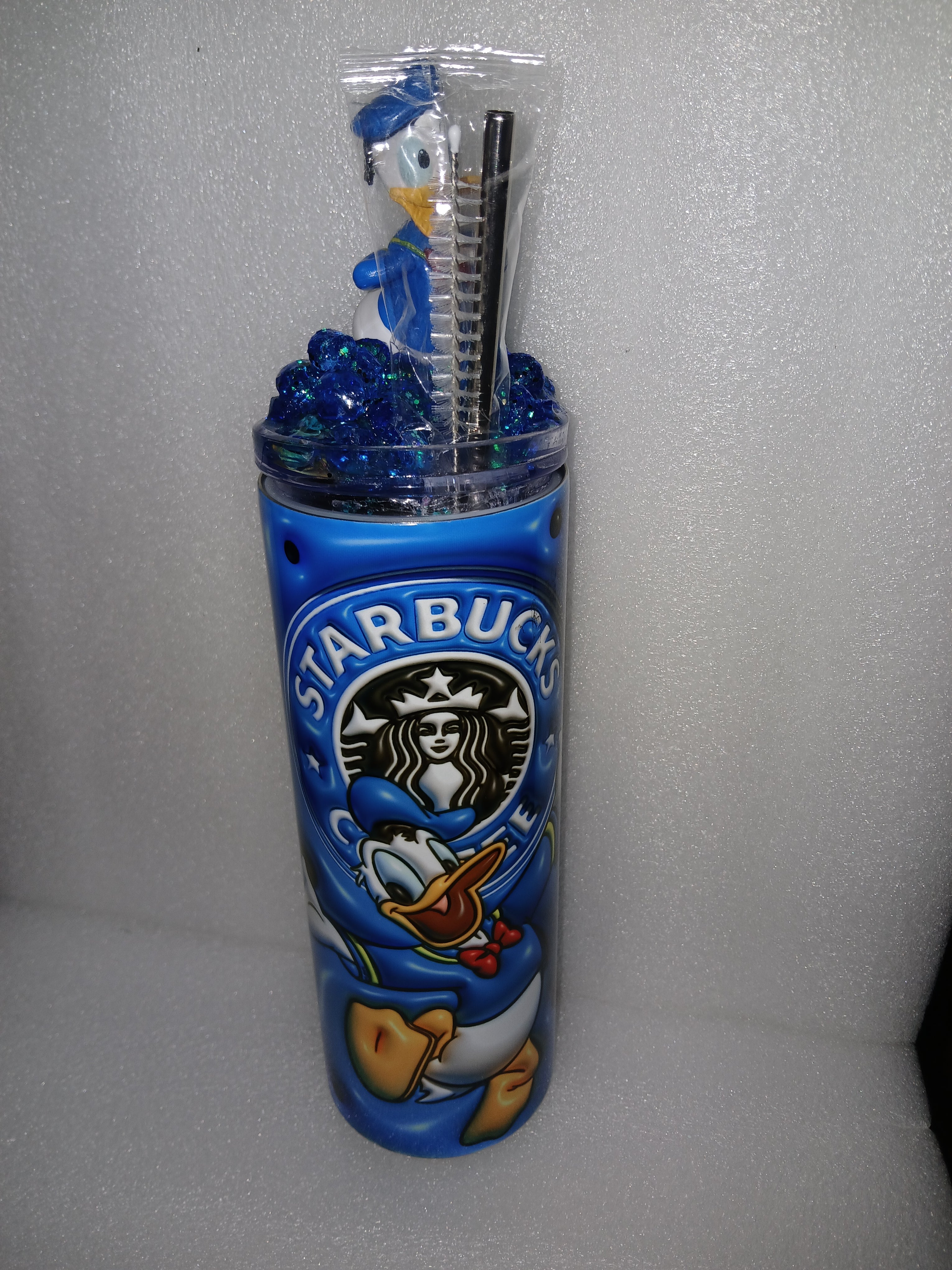 Donald Duck 20 oz tumbler with customized topper